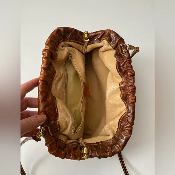 Furla Suede Vintage Brown Crossbody Gold Hardware looks like tiny cat paw prints